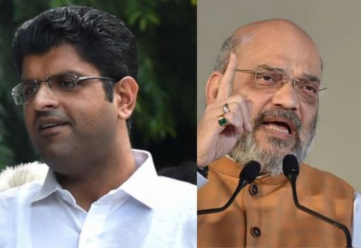 Jannayak Janata Party leader Dushyant Chautala and Amit Shah