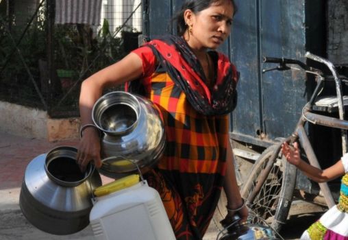 woman fetching water